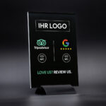 Kombi Tripadvisor und Google Bewertungen Tischaufsteller aus Acrylglas mit NFC-Technologie. Personaliserbar mit Ihrem Logo bedruckt.